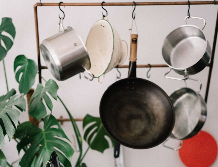 photo of kitchen pans on rack