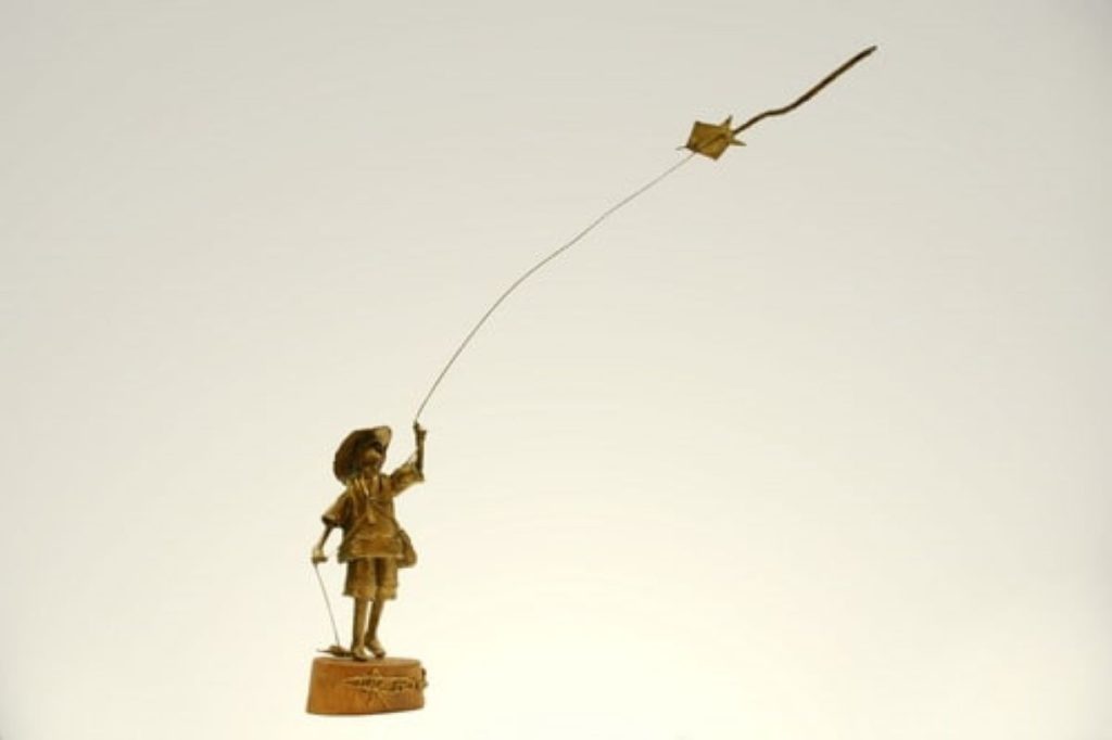 Boy with a kite by Michael Cacnio