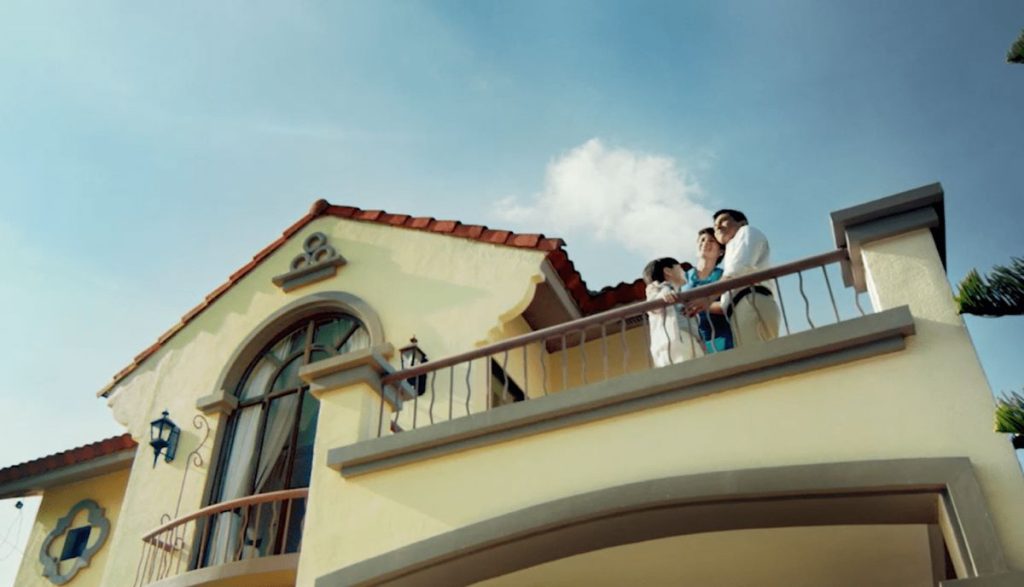 Crown Asia house model with family on the balcony