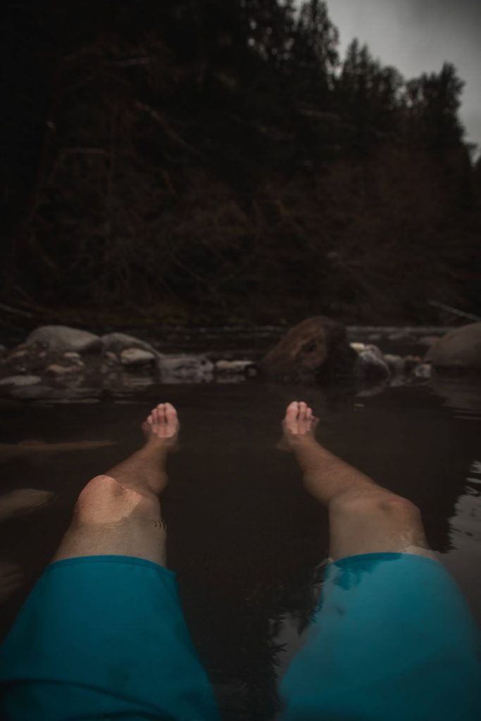 Man-Enjoying-a-Dip-in-a-Hot-Spring