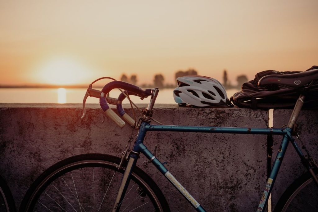 a photo of a bicycle and helmet