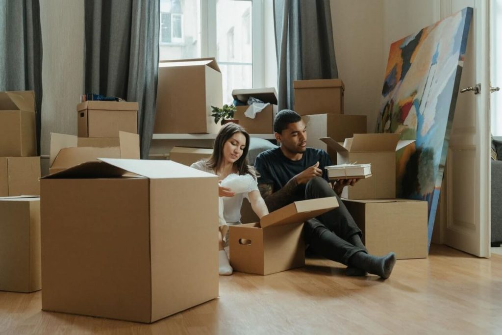 married couple moving into a new house