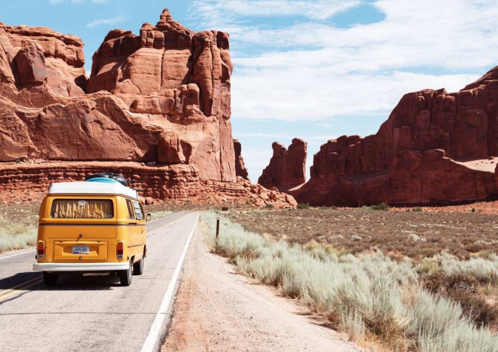 photo of a Volkswagen wan driving on the road in the Arizona