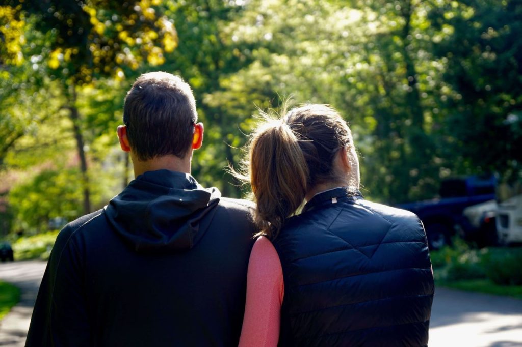 photo of a couple having a morning walk