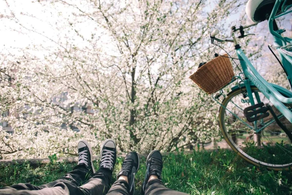 photo of a couple with their bikes