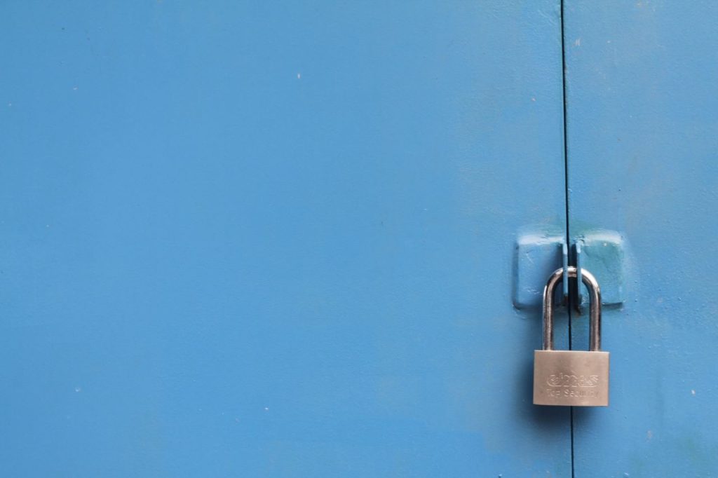 photo of a door with a padlock