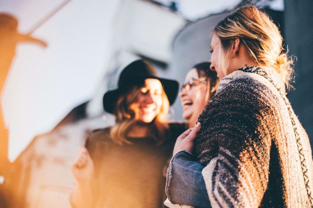 photo of a group of friends laughing