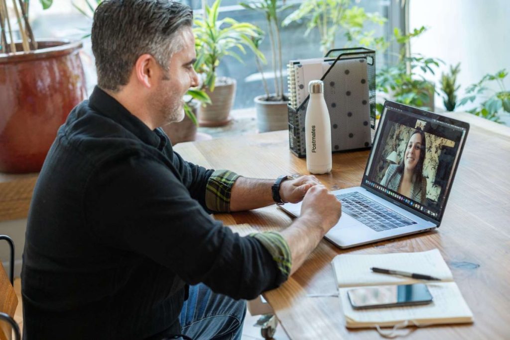 photo of a man in a zoom meeting