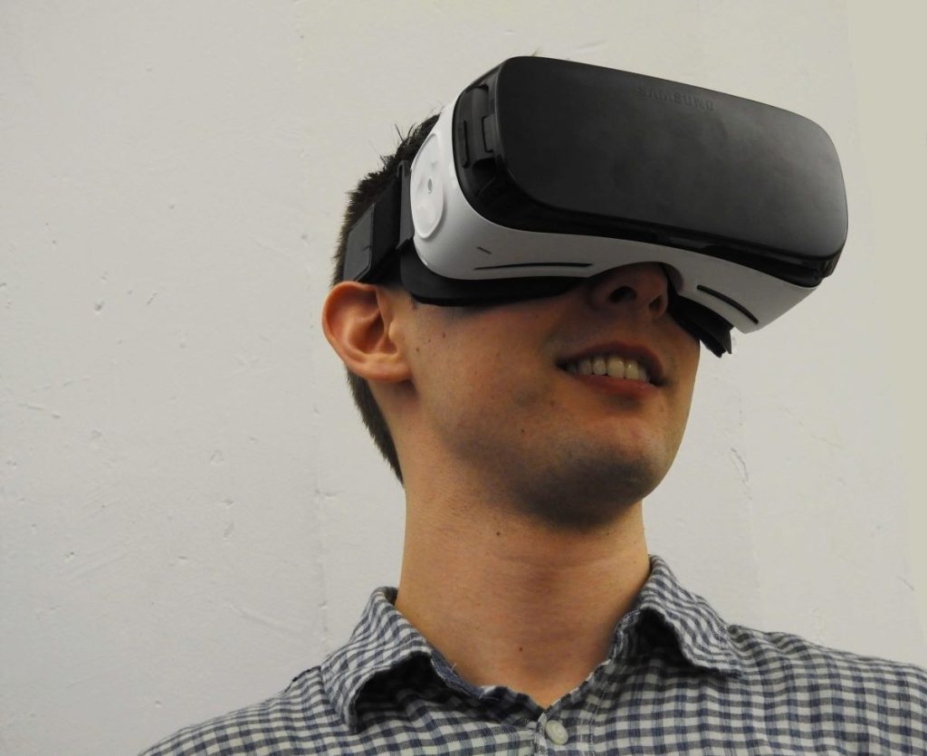 photo of a man wearing a VR