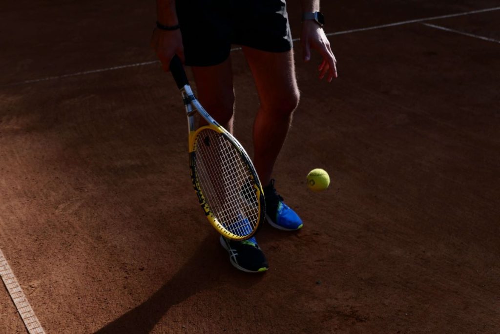photo of a person playing tennis