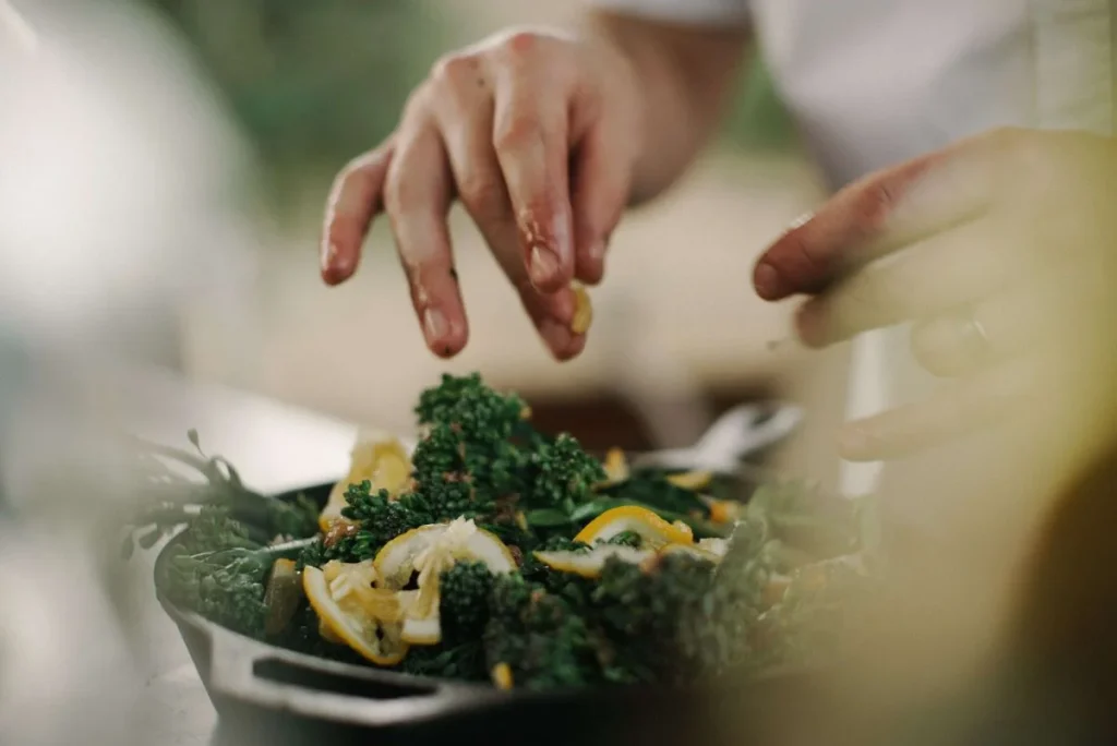 photo of a person preparing a salad