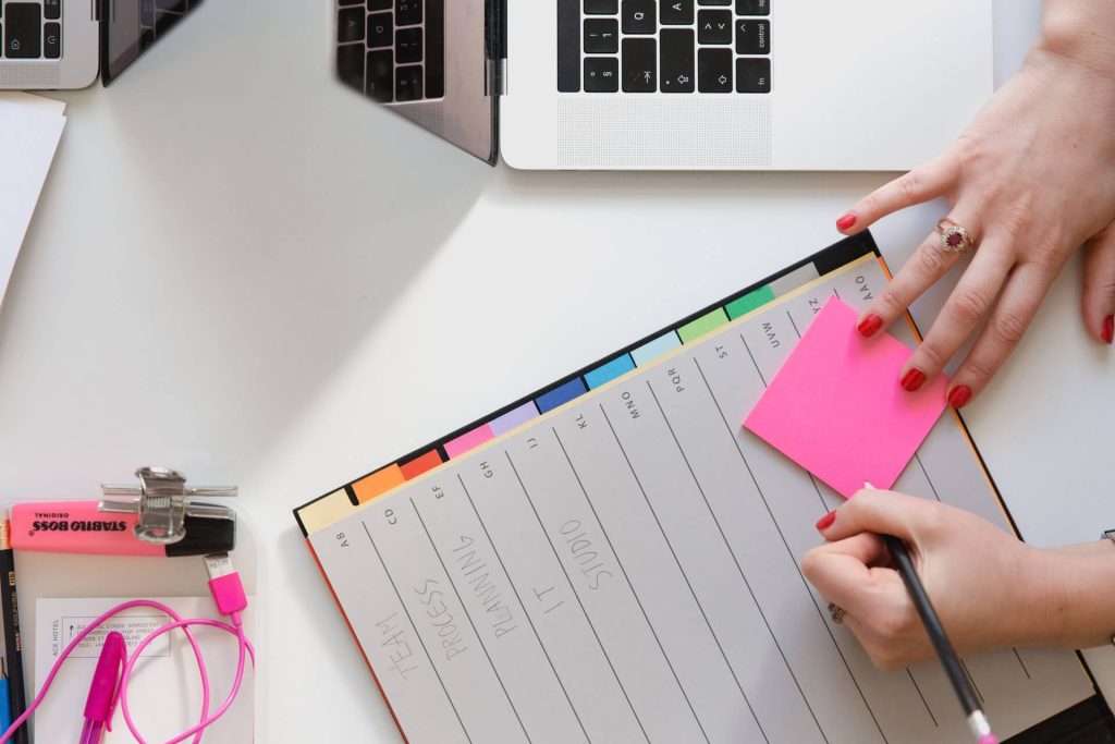 photo of a person preparing their planner