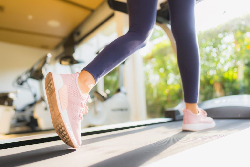 photo of a person running on a treadmill