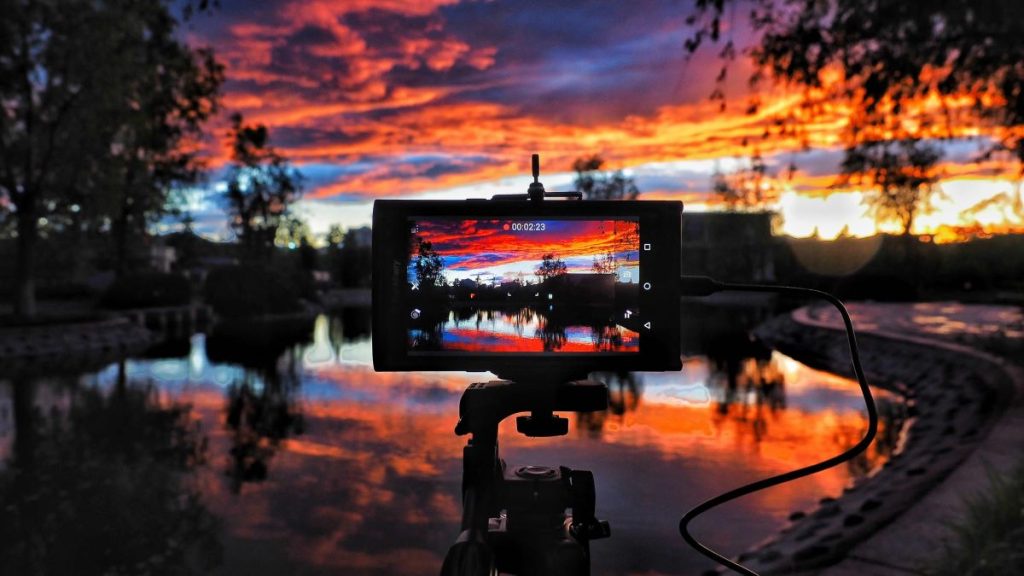 photo of a phone taking a photo of a scenery