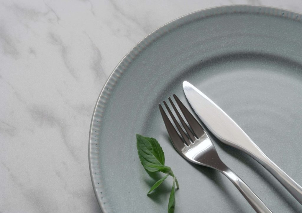 photo of a plate and utensils