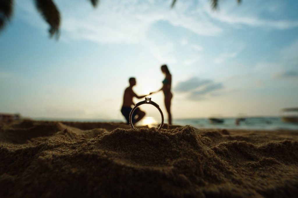 photo of a proposal and ring