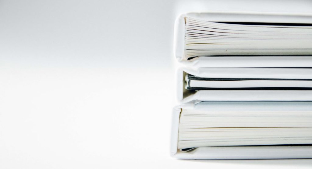 photo of a stack of document binders