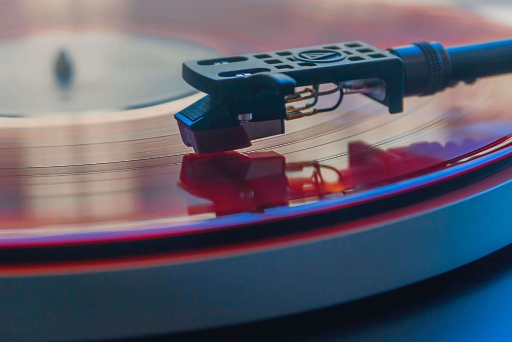 photo of a vinyl playing on a player