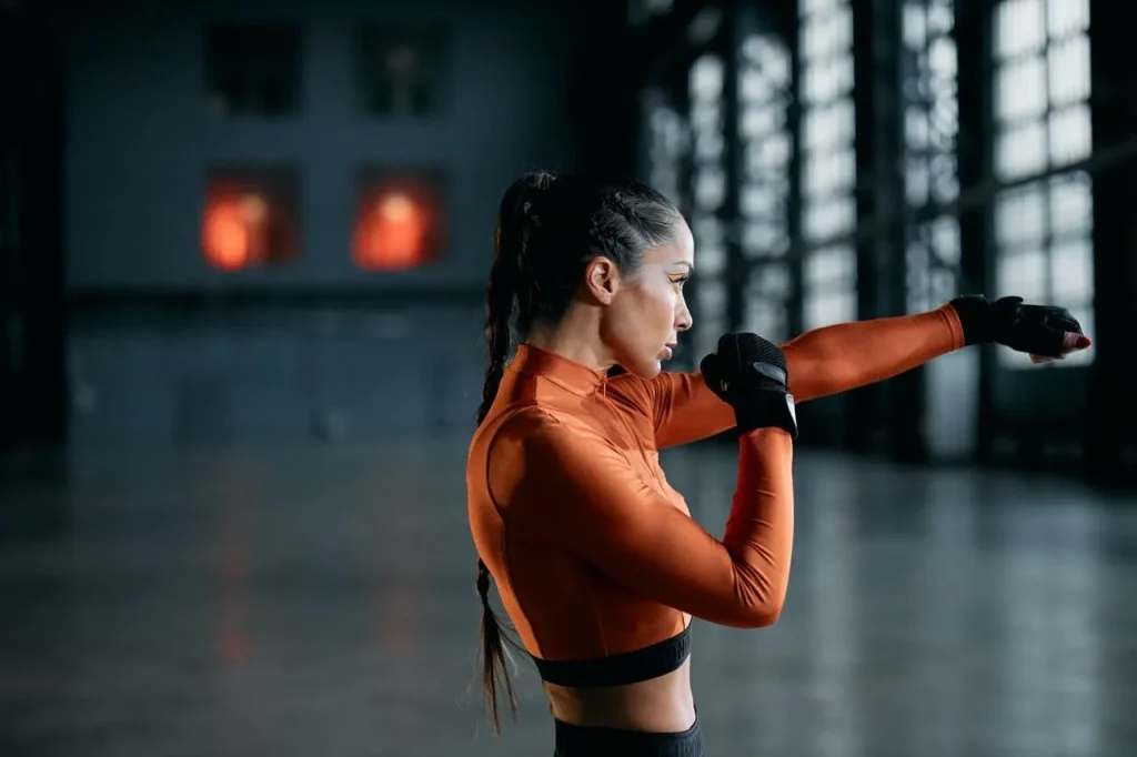 photo of a woman shadow boxing