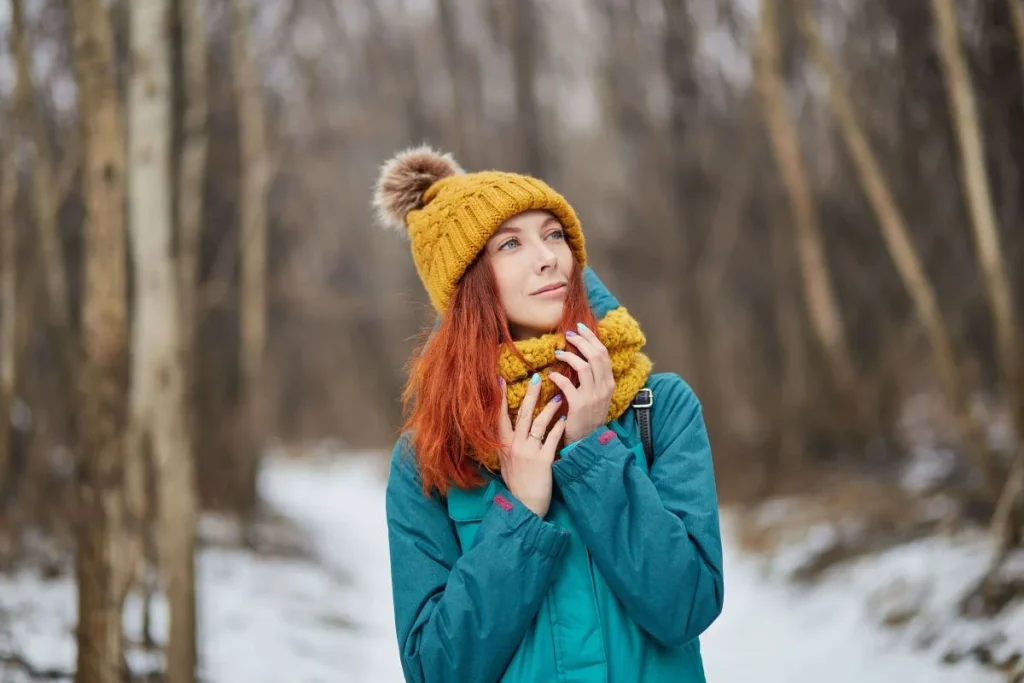 photo of a woman wearing winter clothes