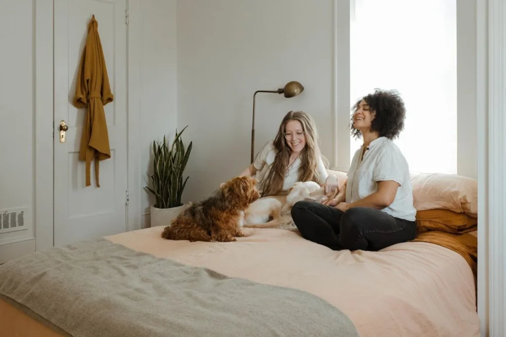 photo of owners and a dog