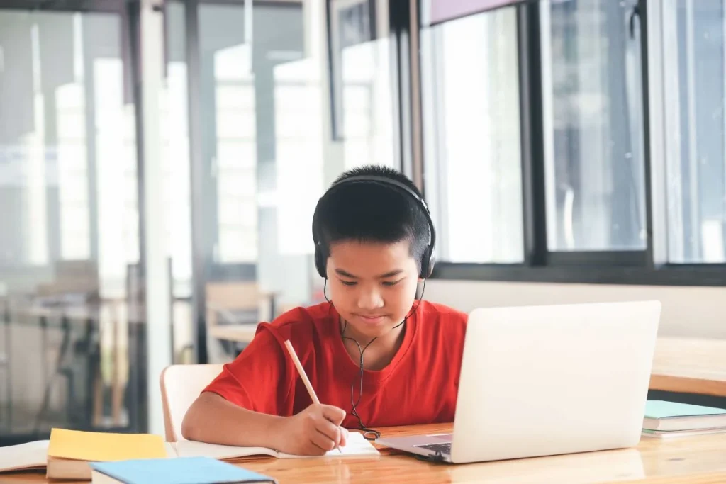 A-Kid-studying-in-his-home