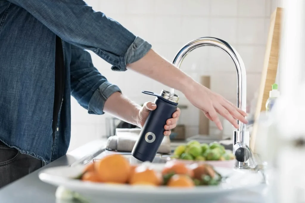 Bringing-your-own-water-bottle-to-get-hydrated-and-to-avoid-heat-related-illnesses