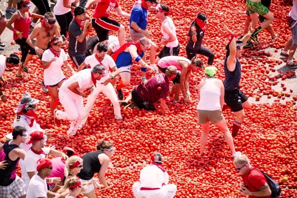 Douse yourselves with tomatoes at the La Tomatina
