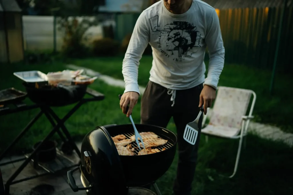 Man-grilling-food