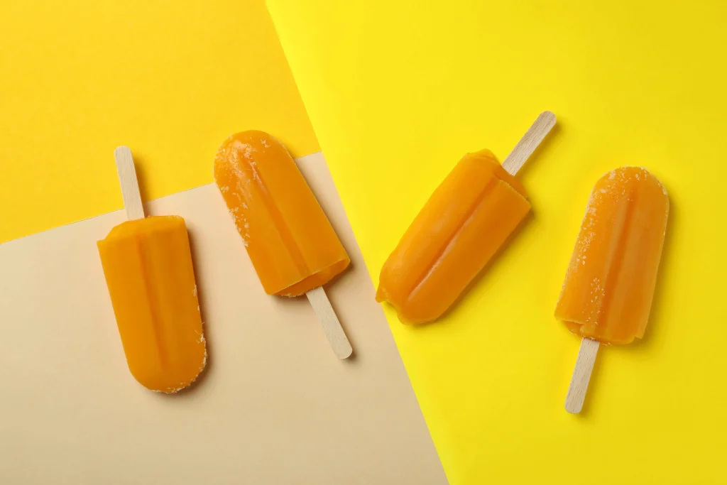 Orange-Mango-Coconut-Popsicles