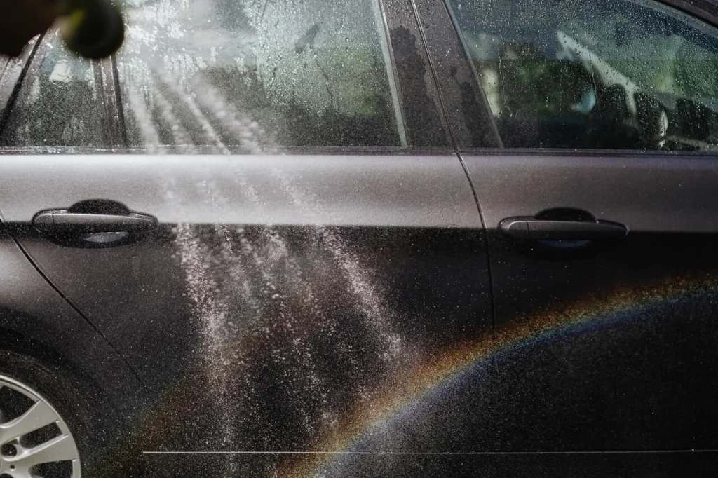 Spraying water on vehicle Spraying-water-on-vehicle