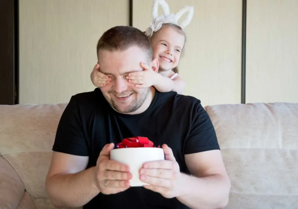 photo of a father and daughter playing