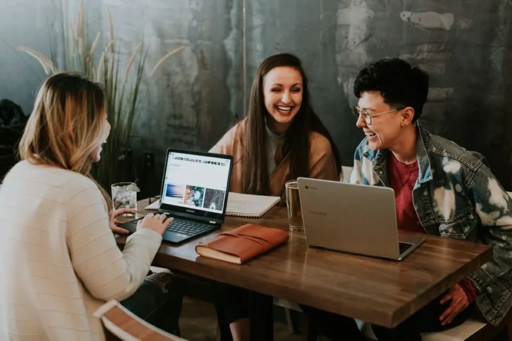 photo of a group of people working outside of the office