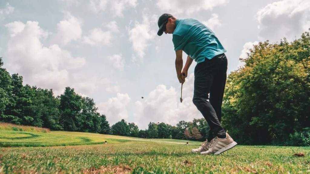 photo of a man playing golf