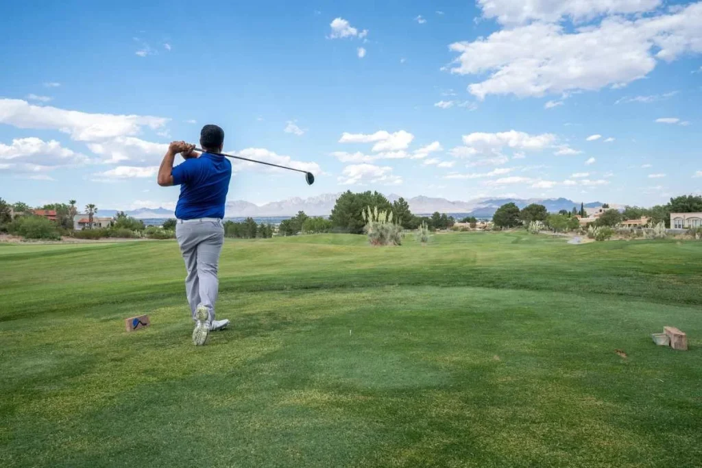 photo of a man playing golf