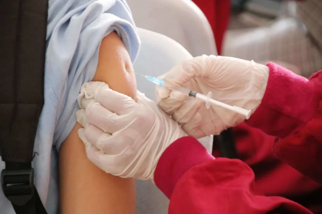 photo of a person getting a vaccine