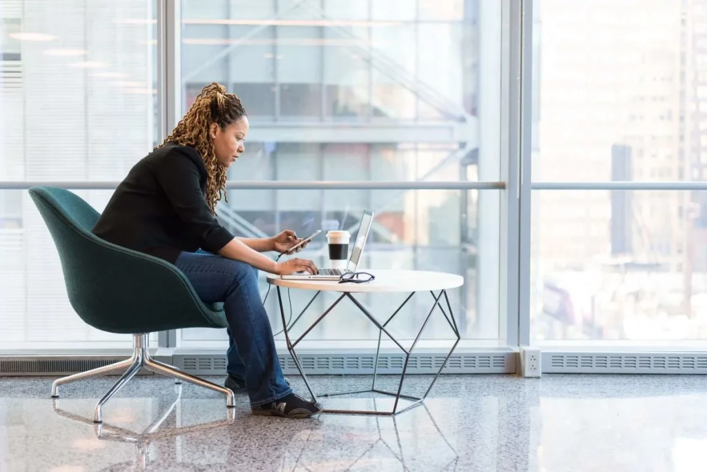 photo of a person working while leaning low