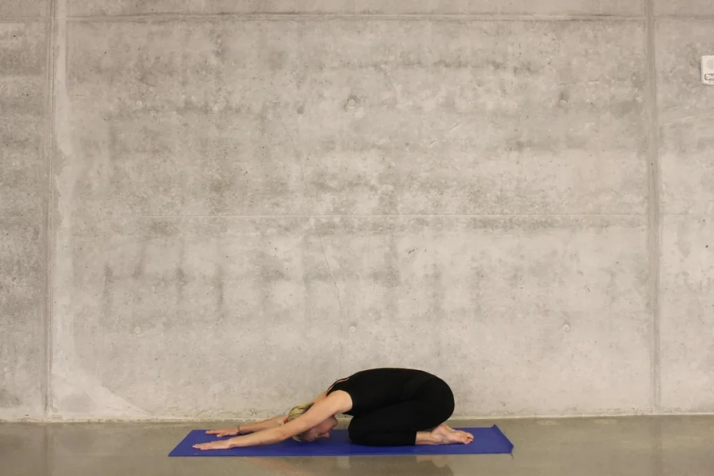 photo of a woman doing yoga