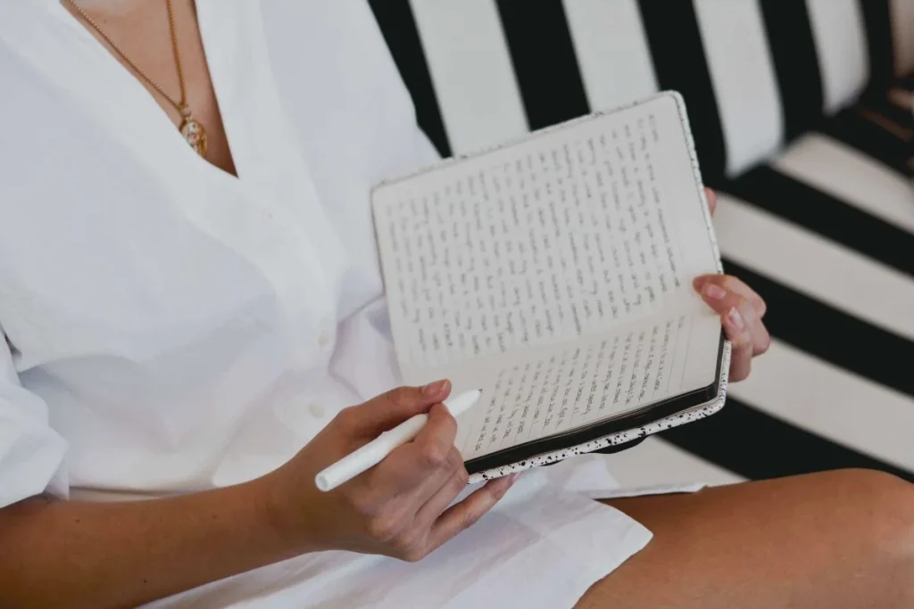 photo of a woman journaling