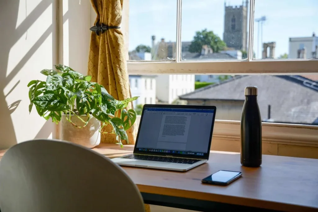 photo of a work desk with a laptop