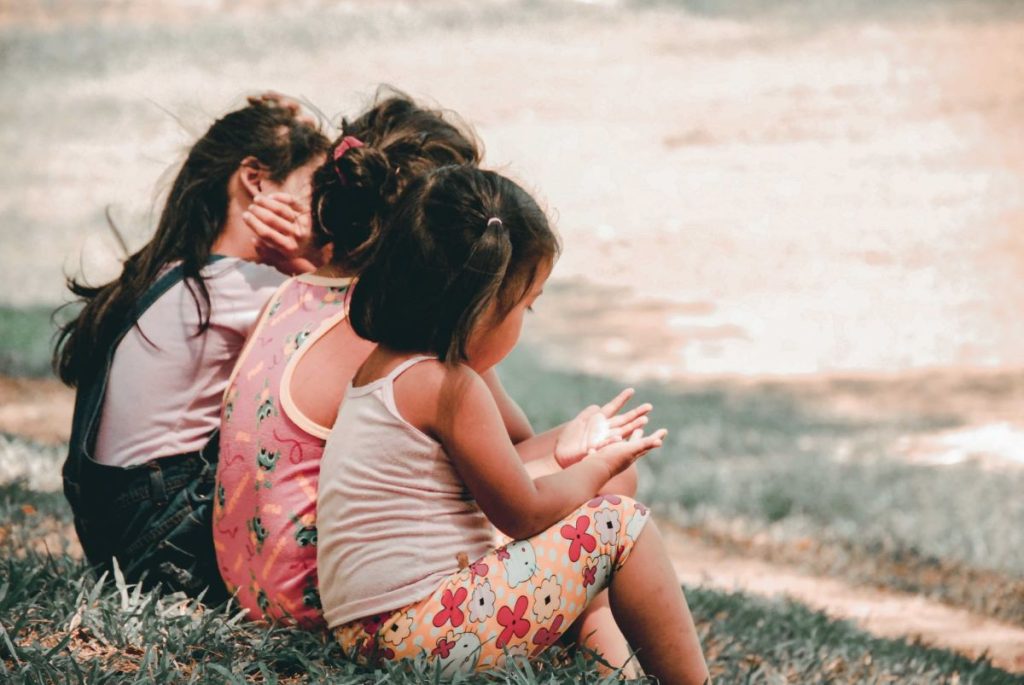 photo of girls playing outside