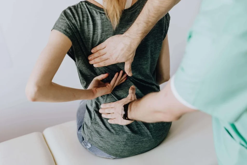 photo of someone having their spine checked