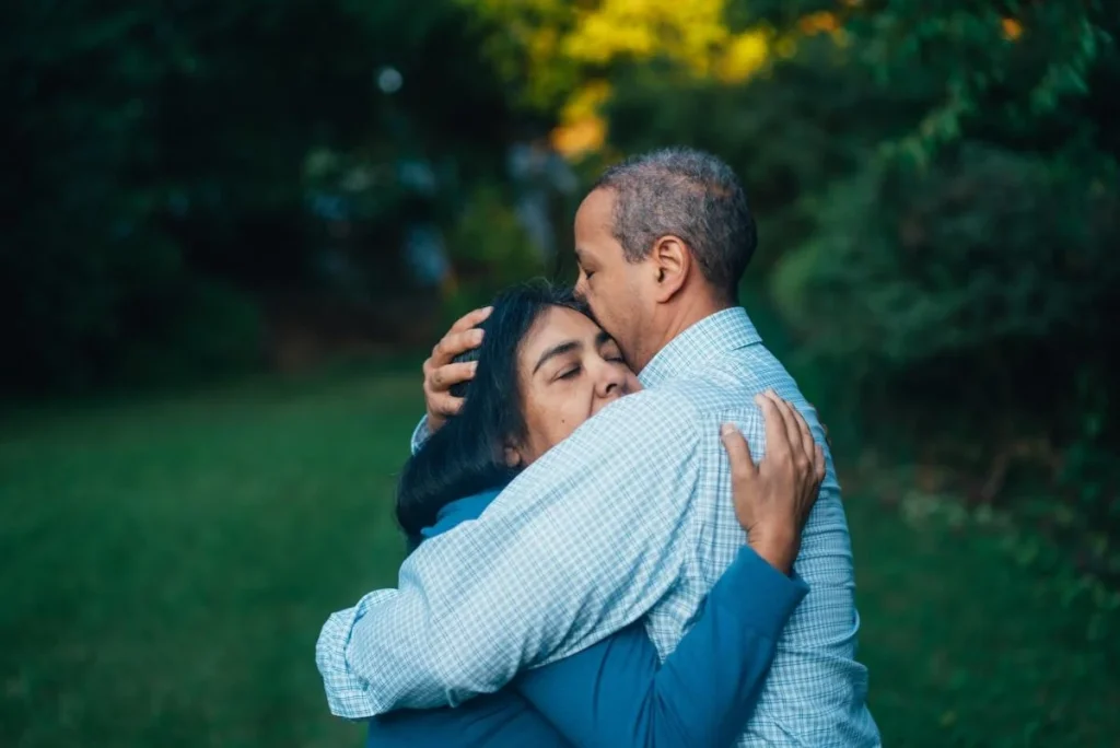 photo of two people in embrace
